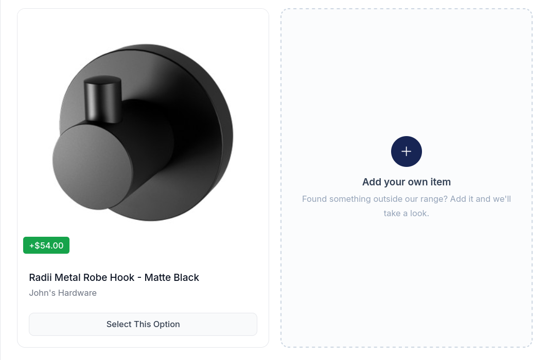 A selection in the client portal. Beside a matte black robe hook priced at +$54.00 sits a dashed card reading Add your own item: Found something outside our range? Add it and we'll take a look.